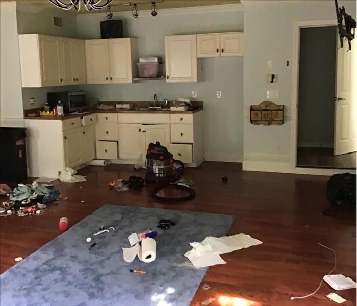 Room covered in trash and debris prior to SERVPRO of Greater St. Augustine cleaning